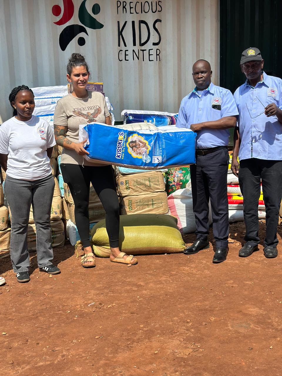 Police officers in compassion program to foster good relations with Kenyans. Police officers in compassion program to foster good relations with Kenyans.